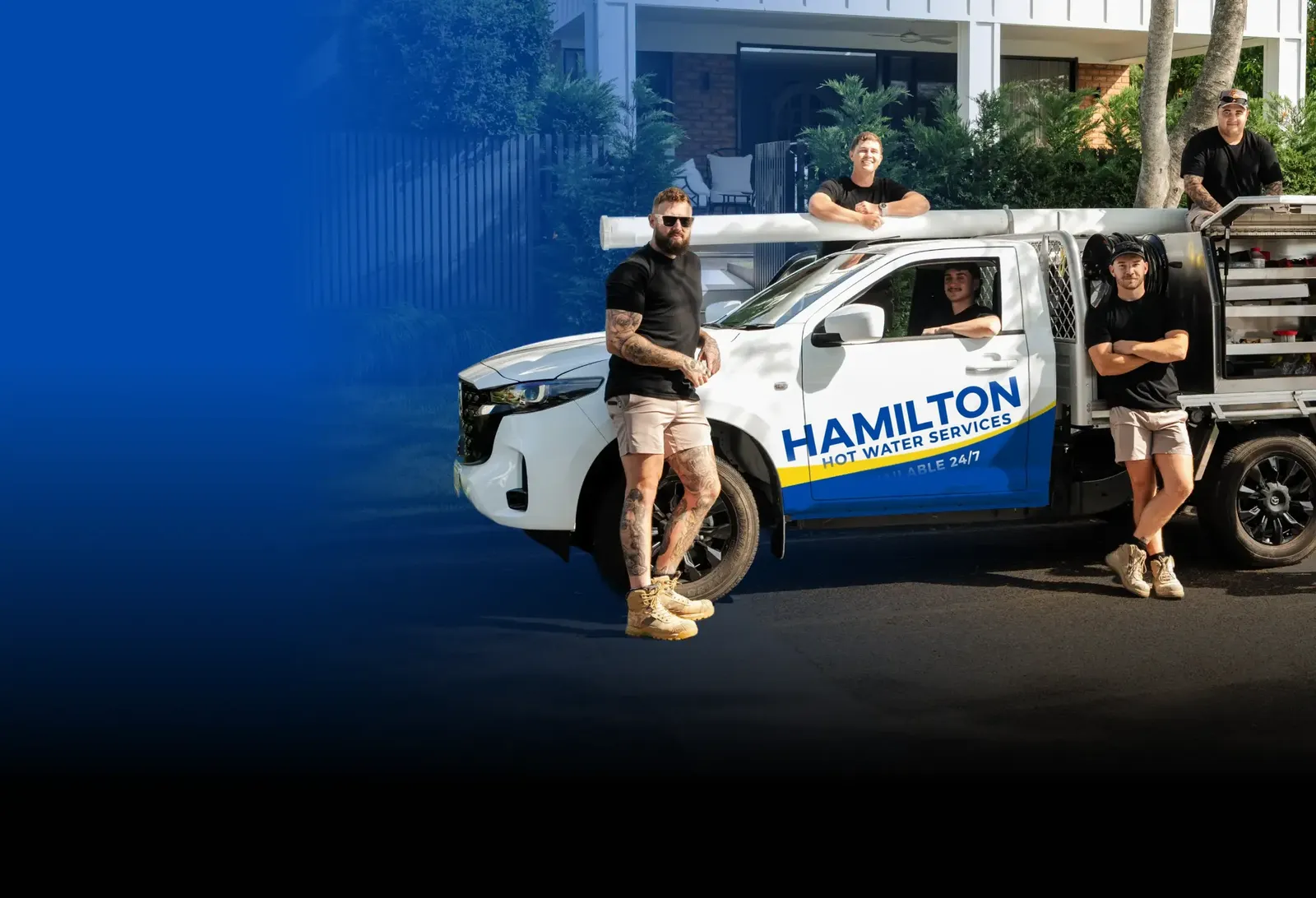 Hamilton Hot Water Services team with the ute